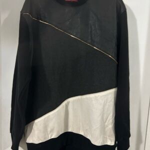 Men used sweater black and white top part is leather look back part is gray